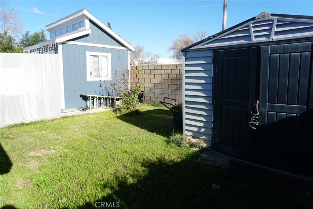 776 Atchison Street Colton, CA 92324 - Photo 17 of 17 Backyard with storage shed