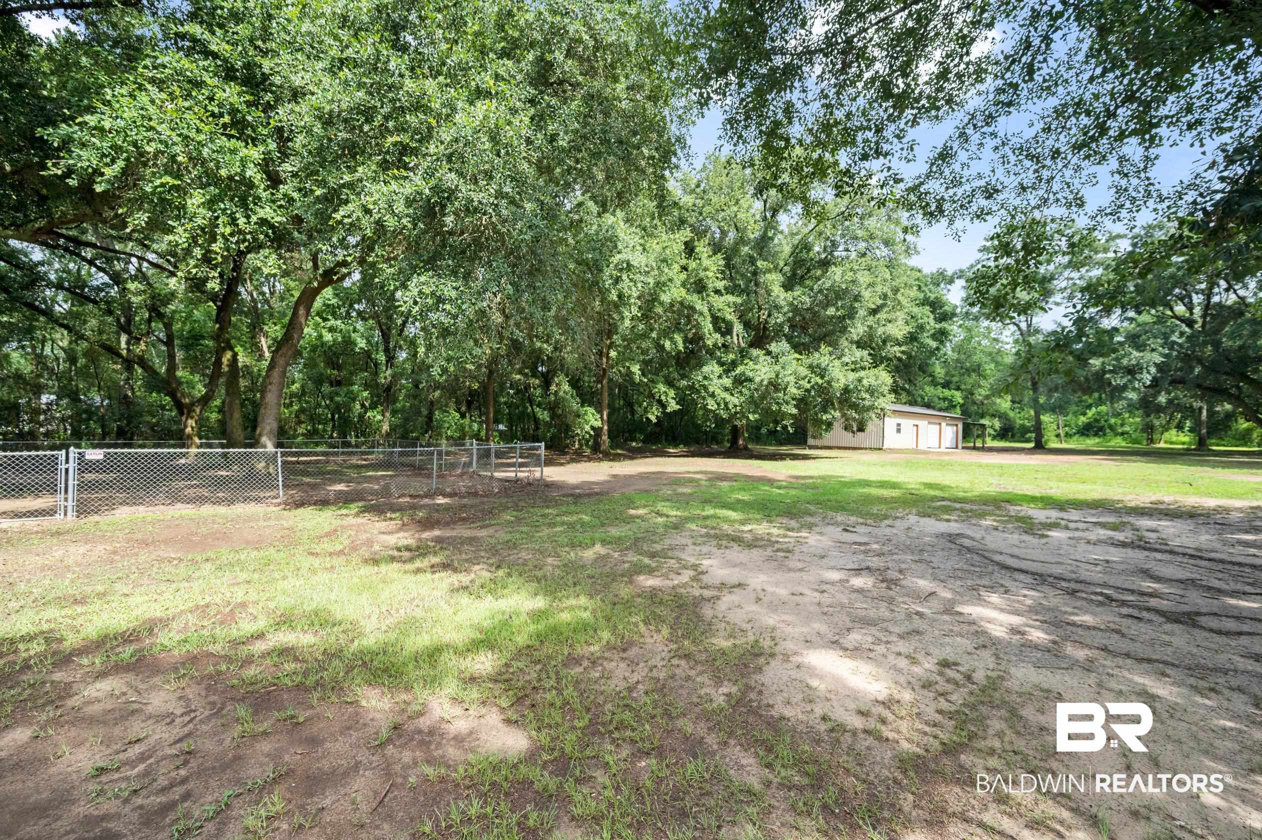 15031 Timber Ridge Drive Loxley, AL 36551 - Photo 38 of 43 View of yard with an outdoor structure
