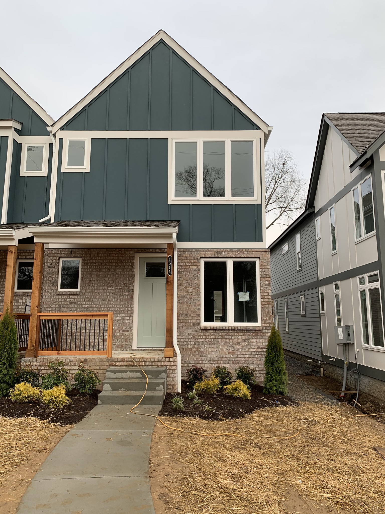 151 A Rains Avenue Nashville, TN 37203 - Photo 1 of 1 a front view of a house with a yard