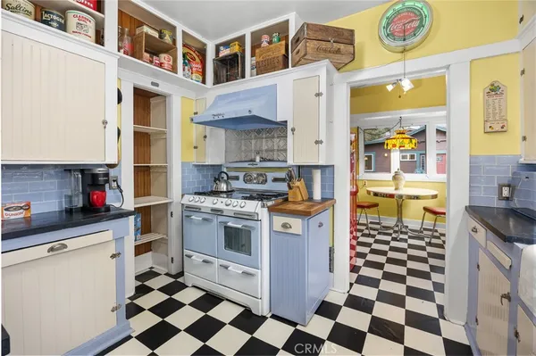 a bedroom with a bed and a chair