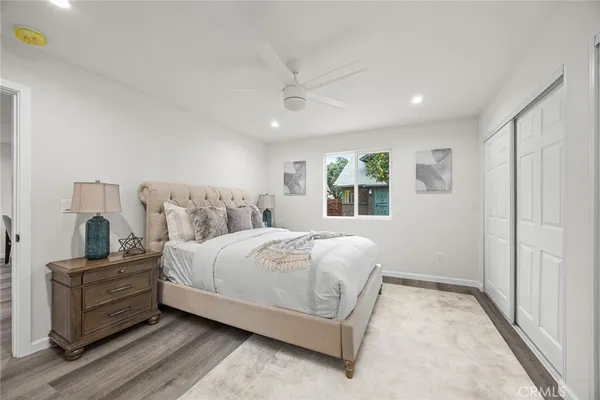 a view of a chairs and table in backyard