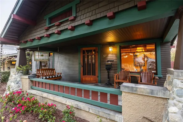 a view of living room kitchen with furniture and outdoor seating