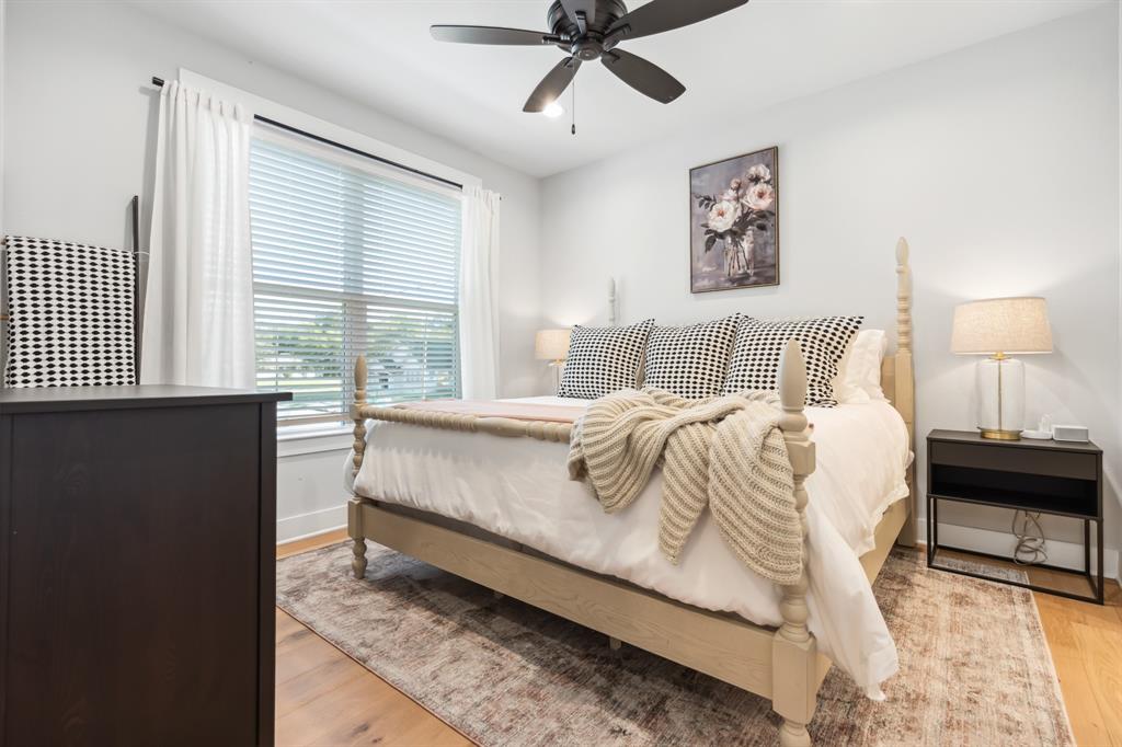 425 Proctor Avenue Waco, TX 76708 - Photo 13 of 33 a bed sitting in a bedroom next to a window