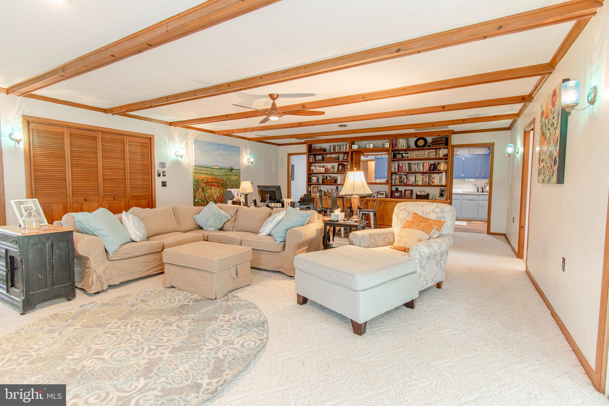 2 Nanticoke Road Cambridge, MD 21613 - Photo 19 of 37 Spacious living area with warm wooden accents.