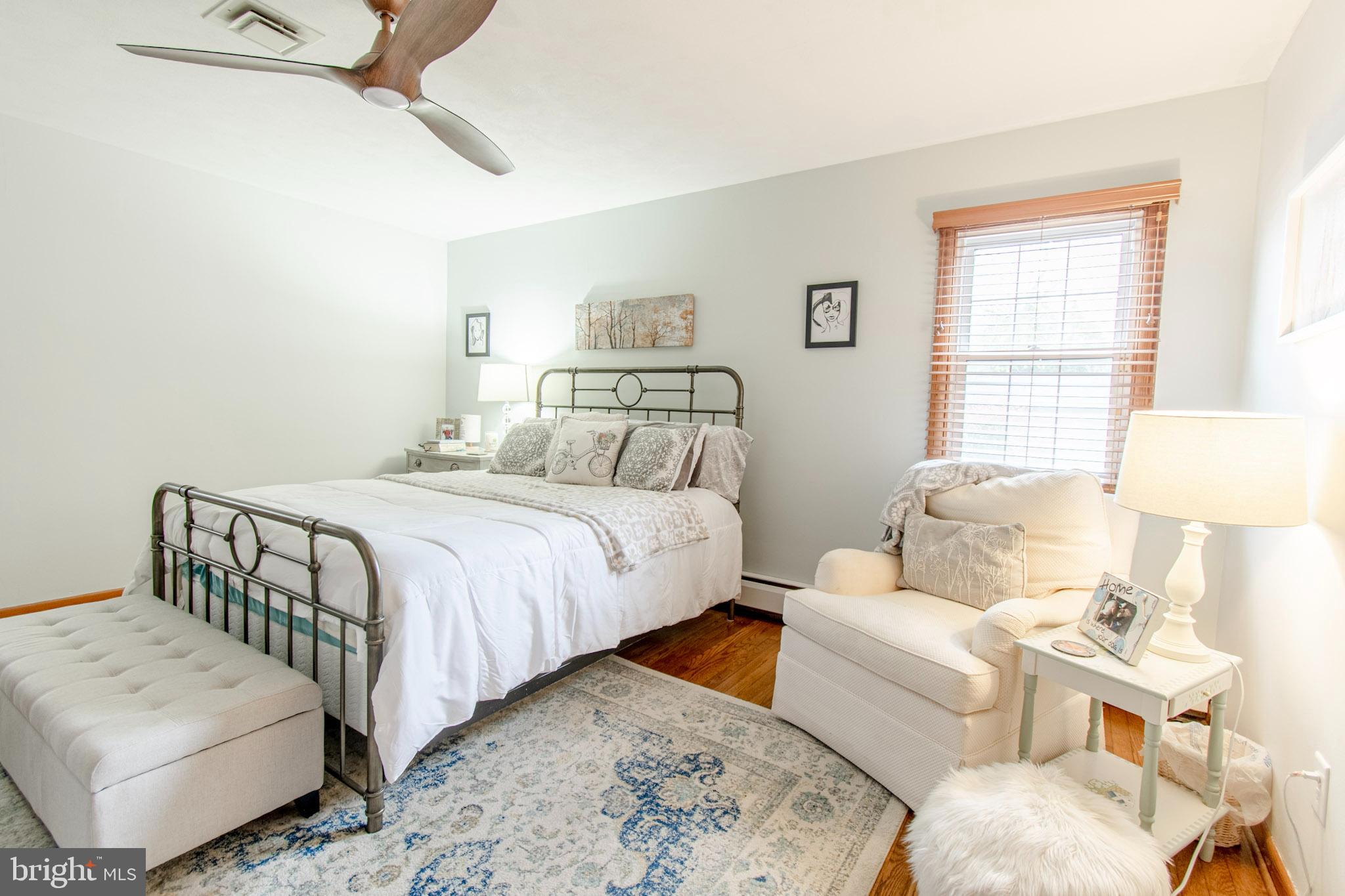 2 Nanticoke Road Cambridge, MD 21613 - Photo 24 of 37 Serene bedroom with natural light and charm.