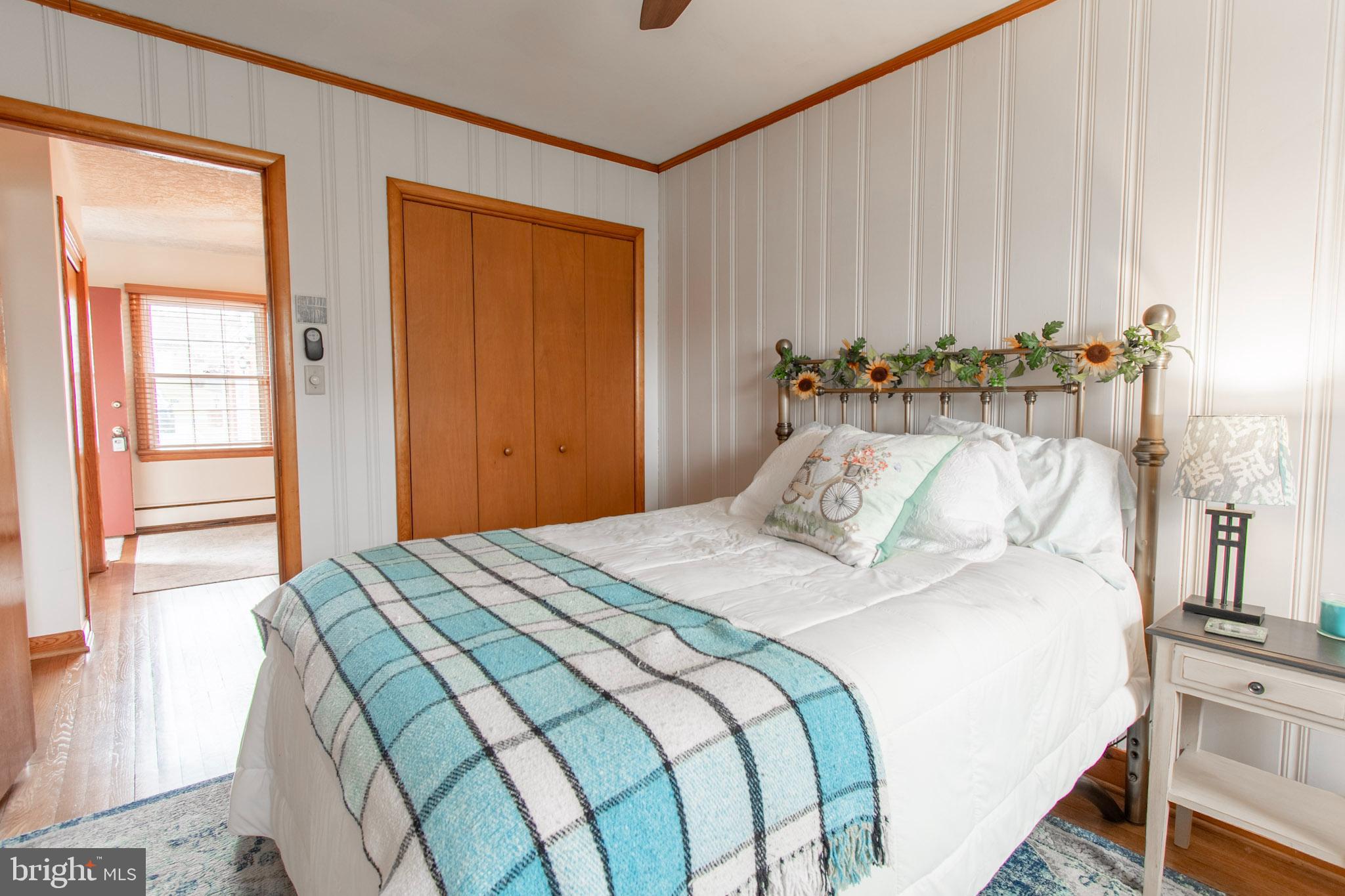 2 Nanticoke Road Cambridge, MD 21613 - Photo 28 of 37 Cozy bedroom with charming decor accents.