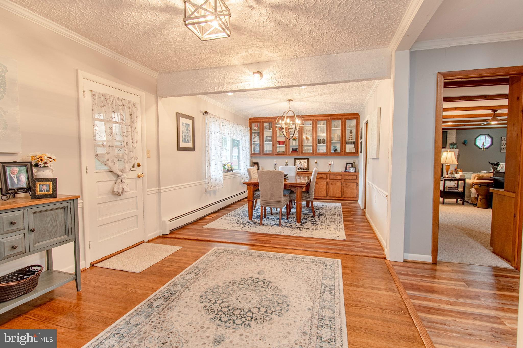 2 Nanticoke Road Cambridge, MD 21613 - Photo 7 of 37 Inviting entryway with warm wooden accents.