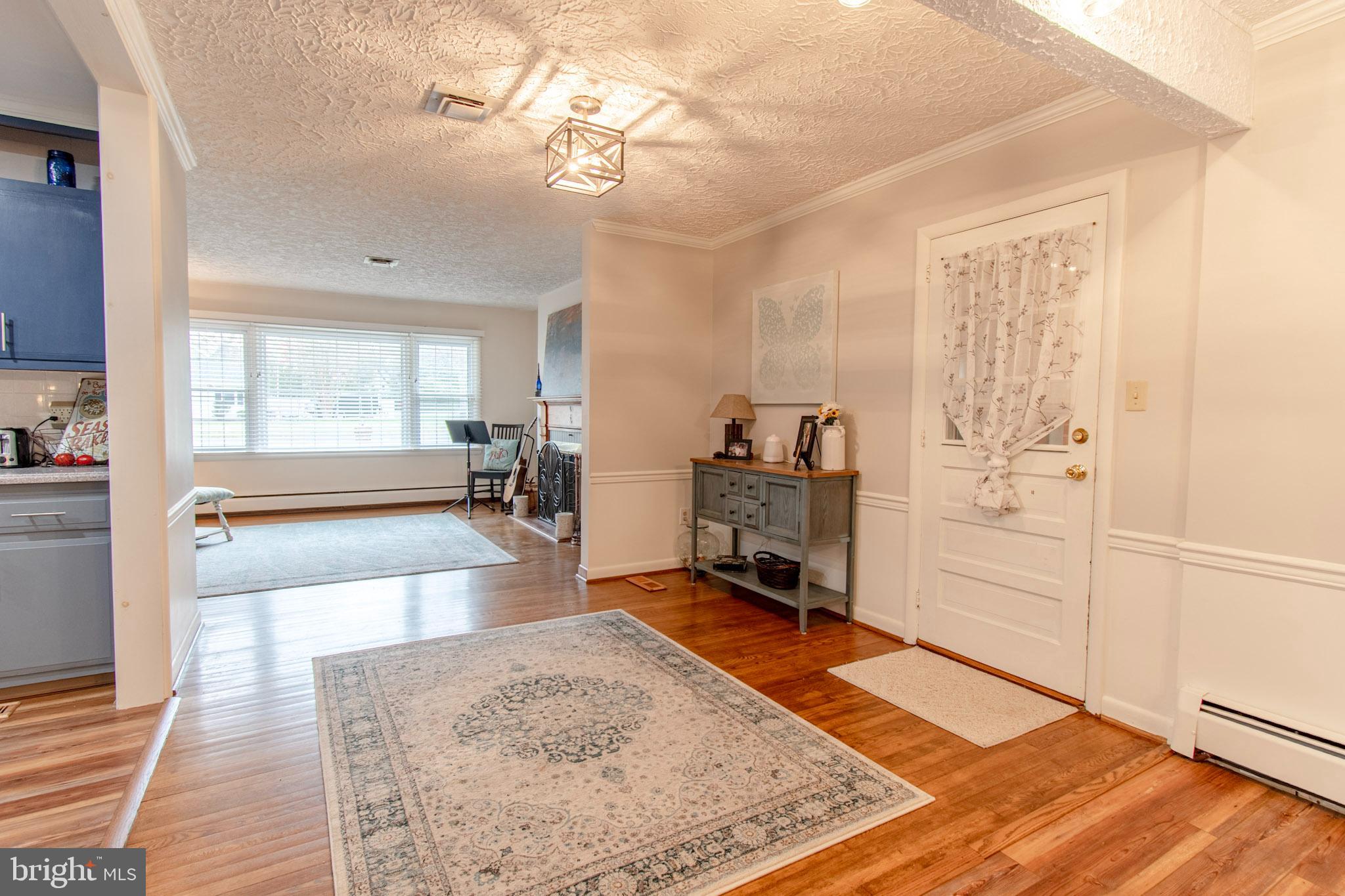 2 Nanticoke Road Cambridge, MD 21613 - Photo 9 of 37 Inviting entryway with warm wooden floors.