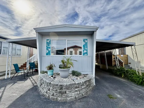 a view of a house with patio