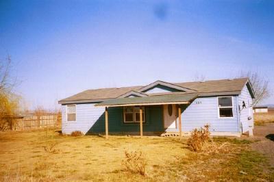 331 Vance Road Mabton, WA 98935 - Photo 1 of 9 a view of a house with a yard