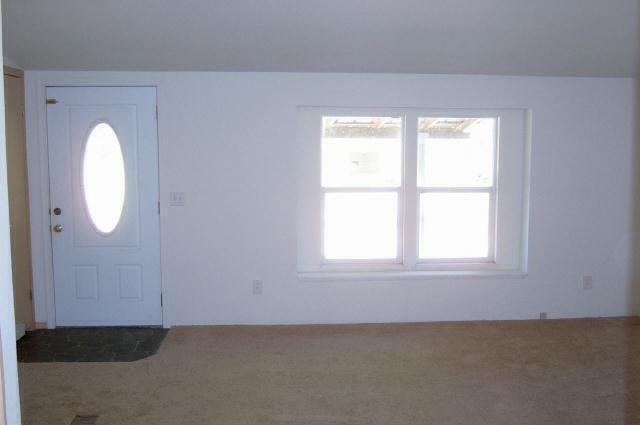 331 Vance Road Mabton, WA 98935 - Photo 4 of 9 an empty room with windows