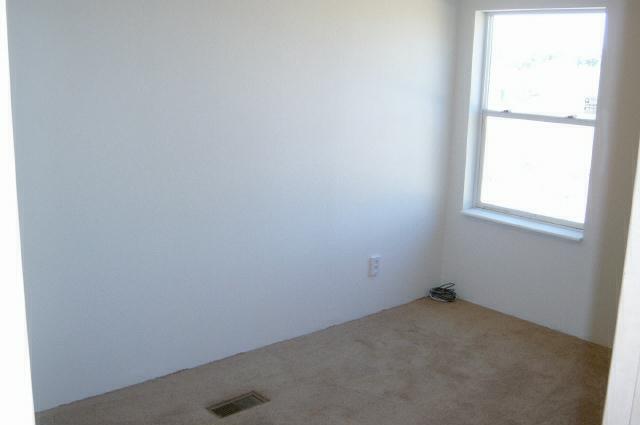331 Vance Road Mabton, WA 98935 - Photo 8 of 9 an empty room with a window
