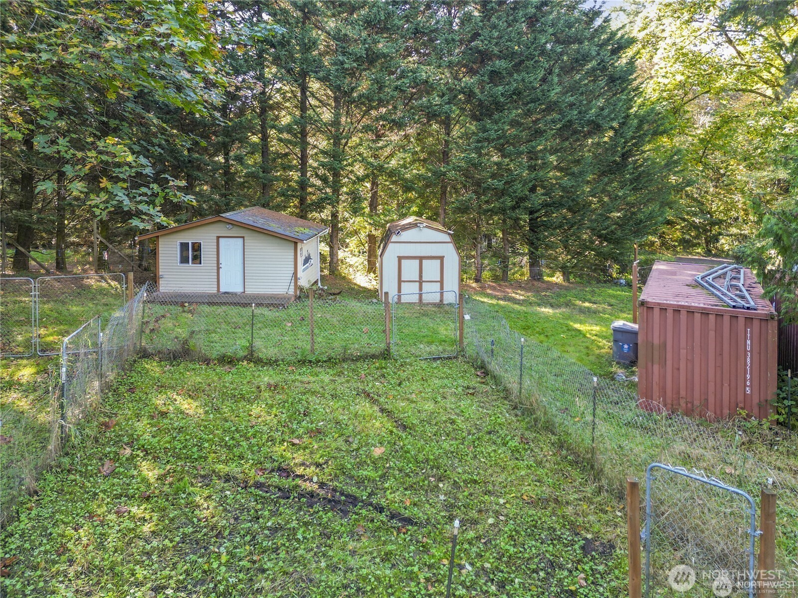 14310 200th Avenue Southeast Renton, WA 98058 - Photo 26 of 39 a front view of a house with garden