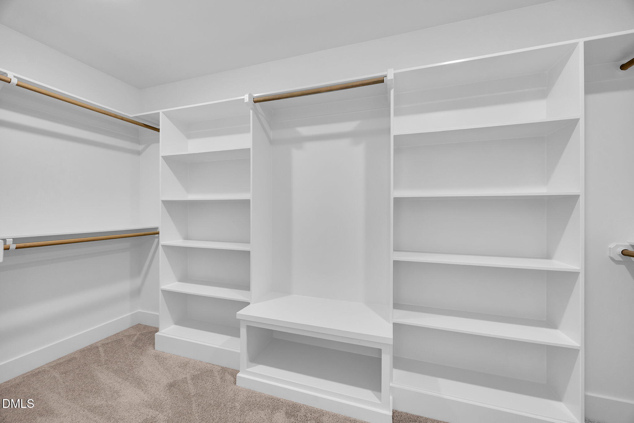 378 Freedom Ridge Drive Smithfield, NC 27577 - Photo 33 of 33 a view of walk in closet with empty racks