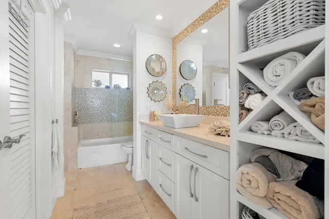 a bathroom with a bathtub and shower