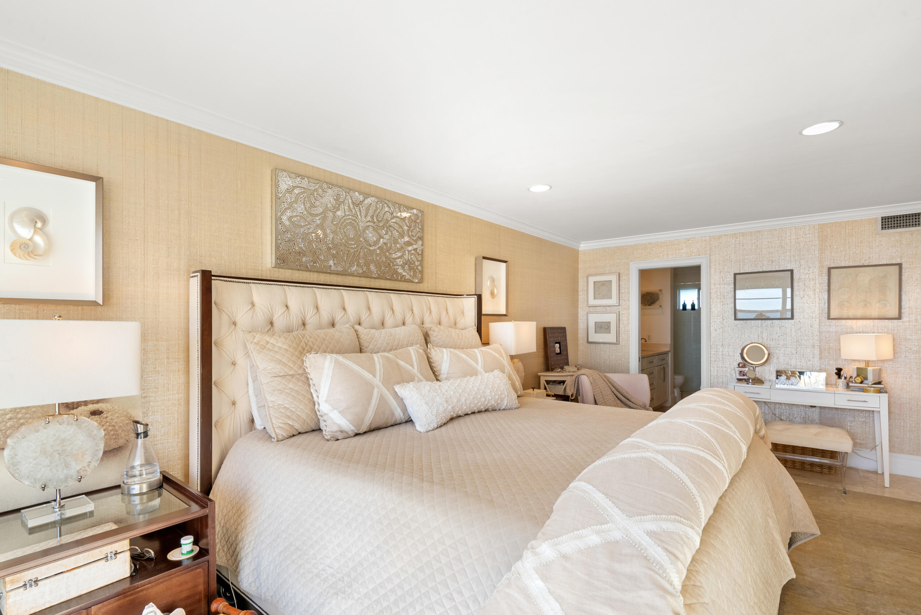 3851 North Ocean Boulevard, Unit 307308 Gulf Stream, FL 33483 - Photo 22 of 26 a bedroom with a bed and wooden floor