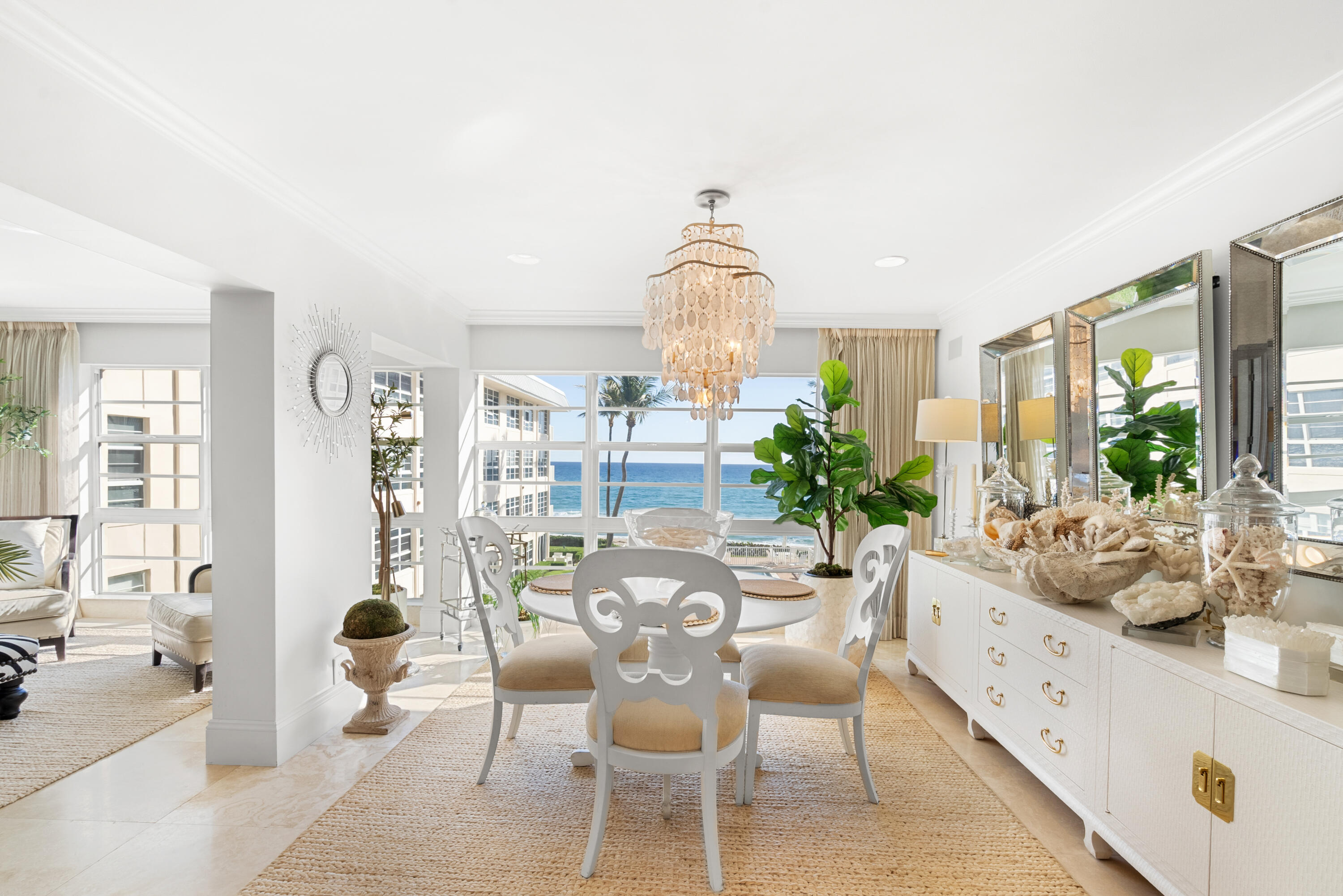 3851 North Ocean Boulevard, Unit 307308 Gulf Stream, FL 33483 - Photo 6 of 26 a view of a dining room with furniture window and outside view