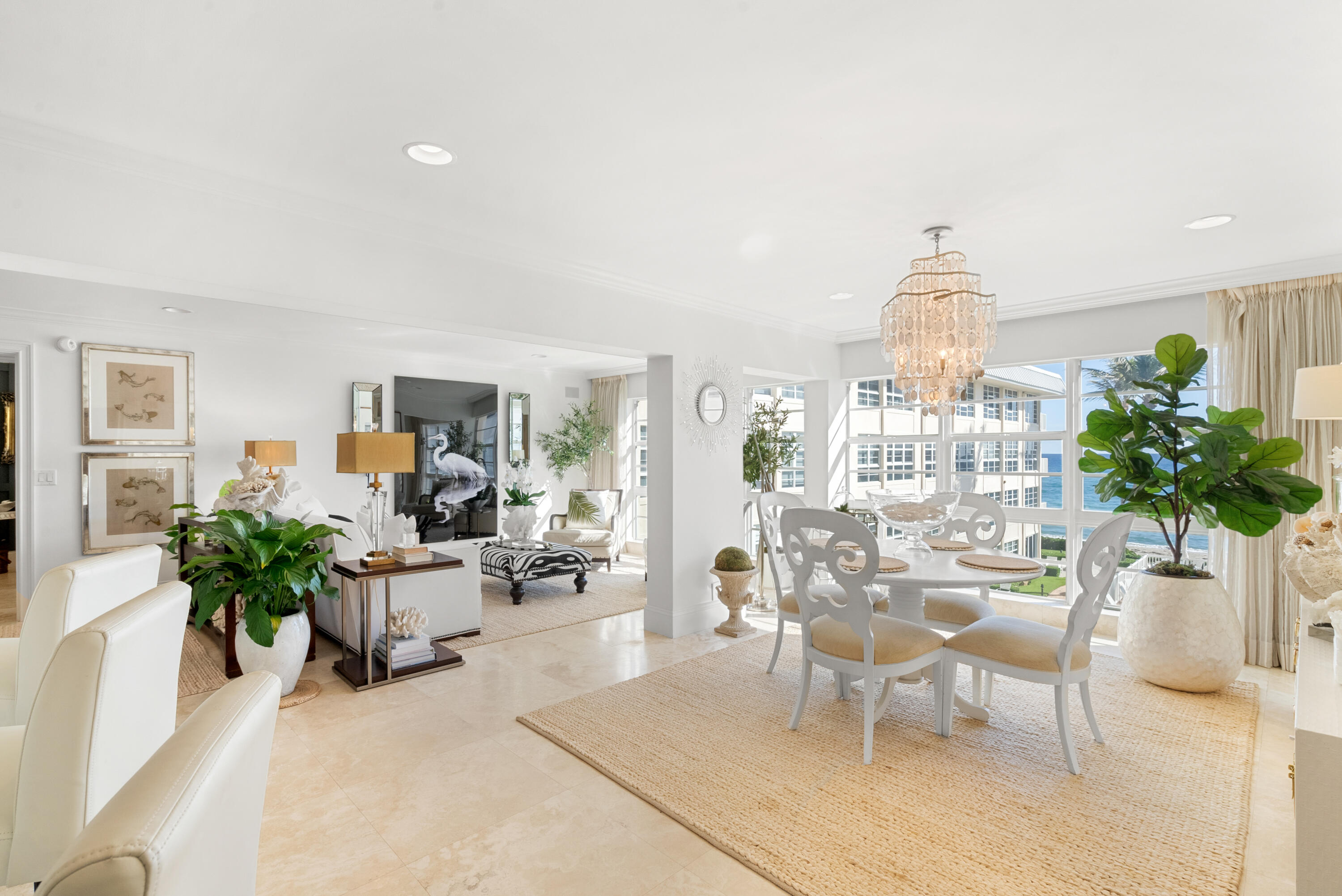 3851 North Ocean Boulevard, Unit 307308 Gulf Stream, FL 33483 - Photo 7 of 26 a view of a dining room with furniture window and outside view