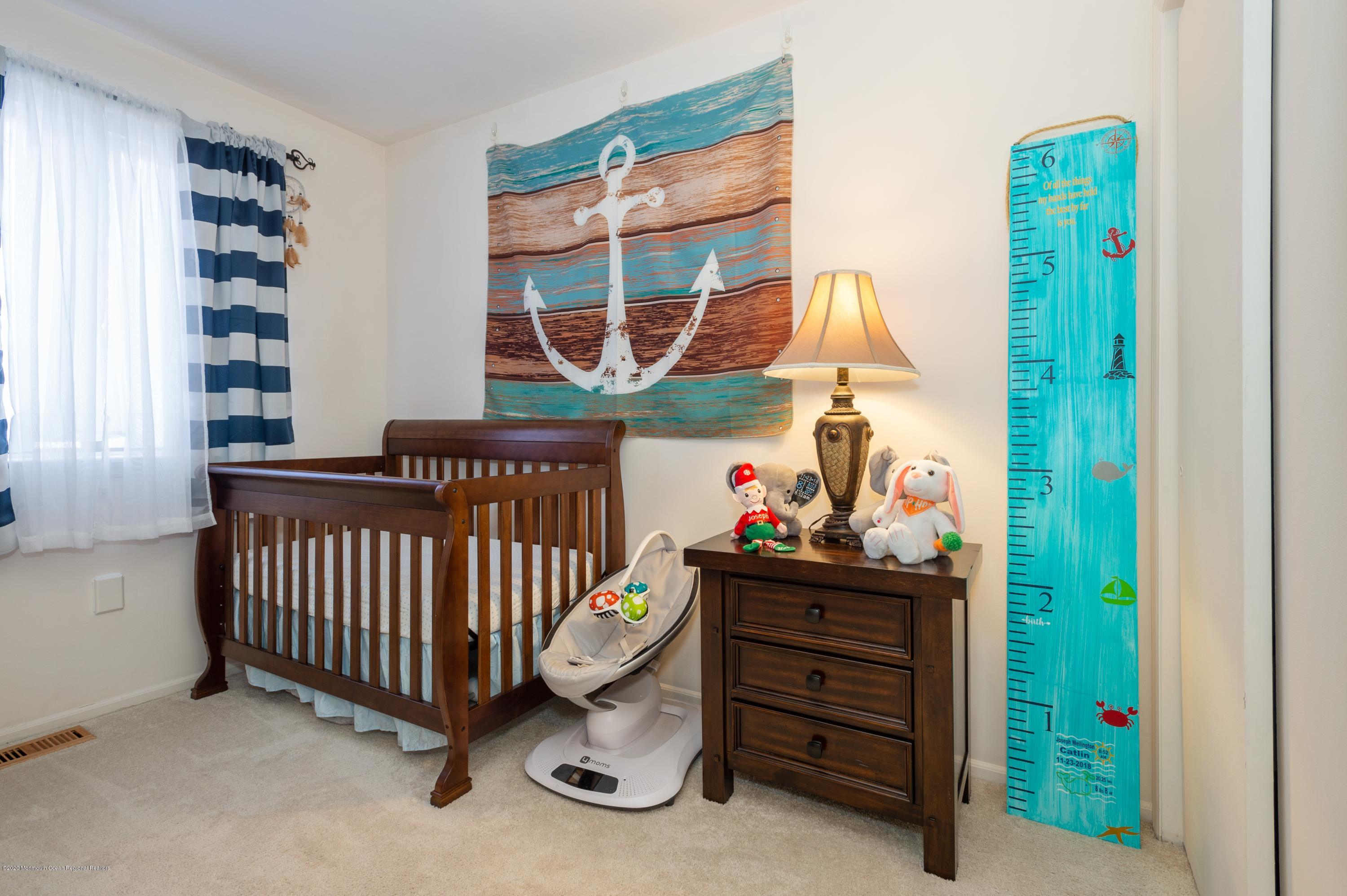 9 Robin Road Howell, NJ 07731 - Photo 17 of 20 16_9RobinRd_153001_2ndBedroom_HiRes