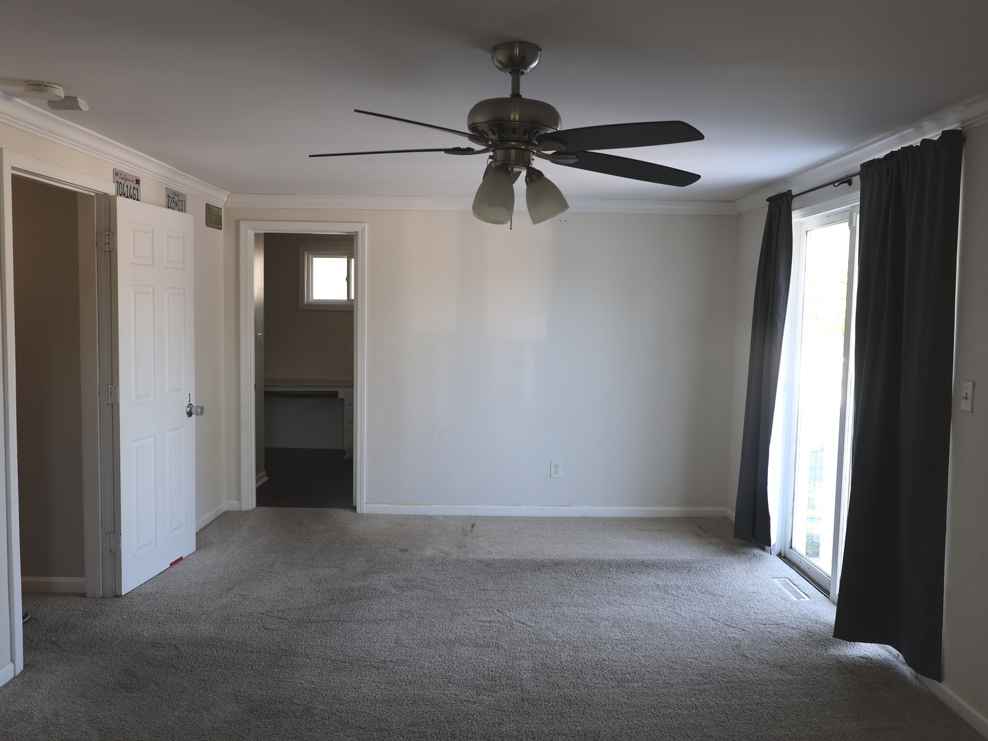 917 North Linden Avenue Waukegan, IL 60085 - Photo 8 of 14 a view of an empty room with a window