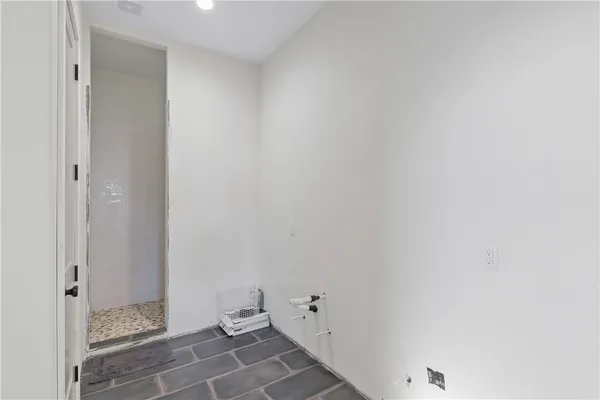 a bathroom with a glass shower
