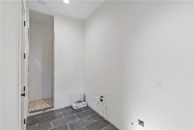 a bathroom with a glass shower