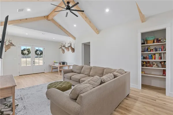 a living room with furniture and a couch