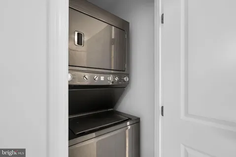 a utility room with washer and dryer