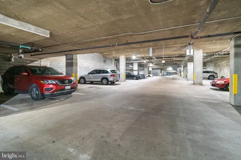 a view of a cars parked in garage