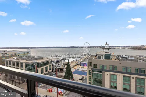 a view of a city skyline from a balcony
