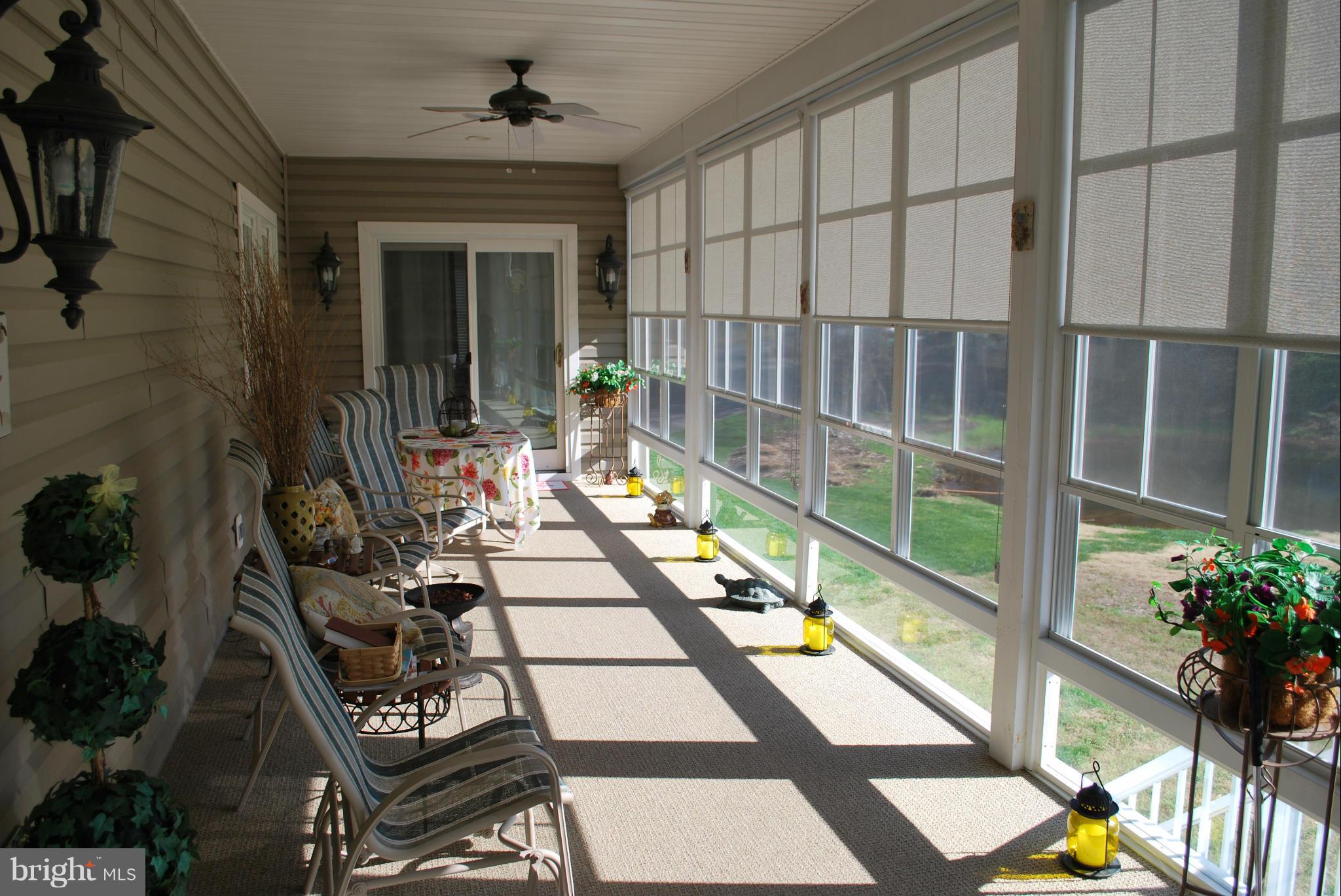 306 Riverside Road Edgewater, MD 21037 - Photo 19 of 30 Enclosed Porch Overlooking Water and Sunsets