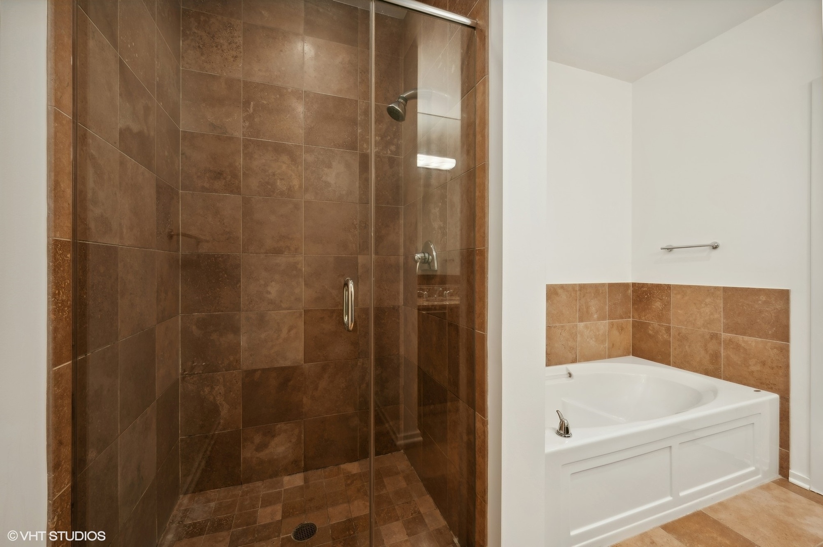 65 East Monroe Street, Unit 4623 Chicago, IL 60603 - Photo 15 of 26 a bathroom with a bath tub and a shower