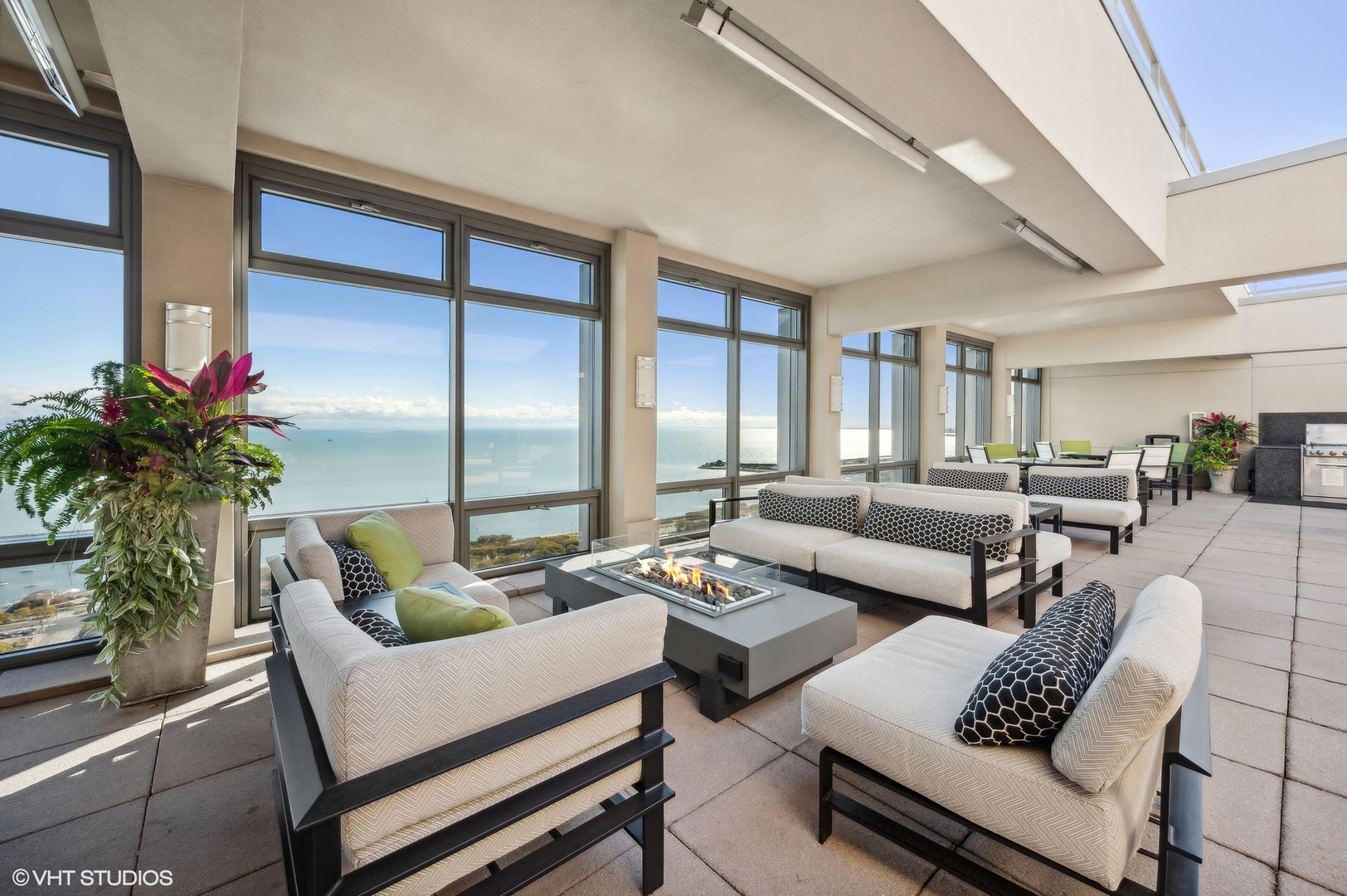 65 East Monroe Street, Unit 4623 Chicago, IL 60603 - Photo 19 of 26 a living room with furniture and a potted plant