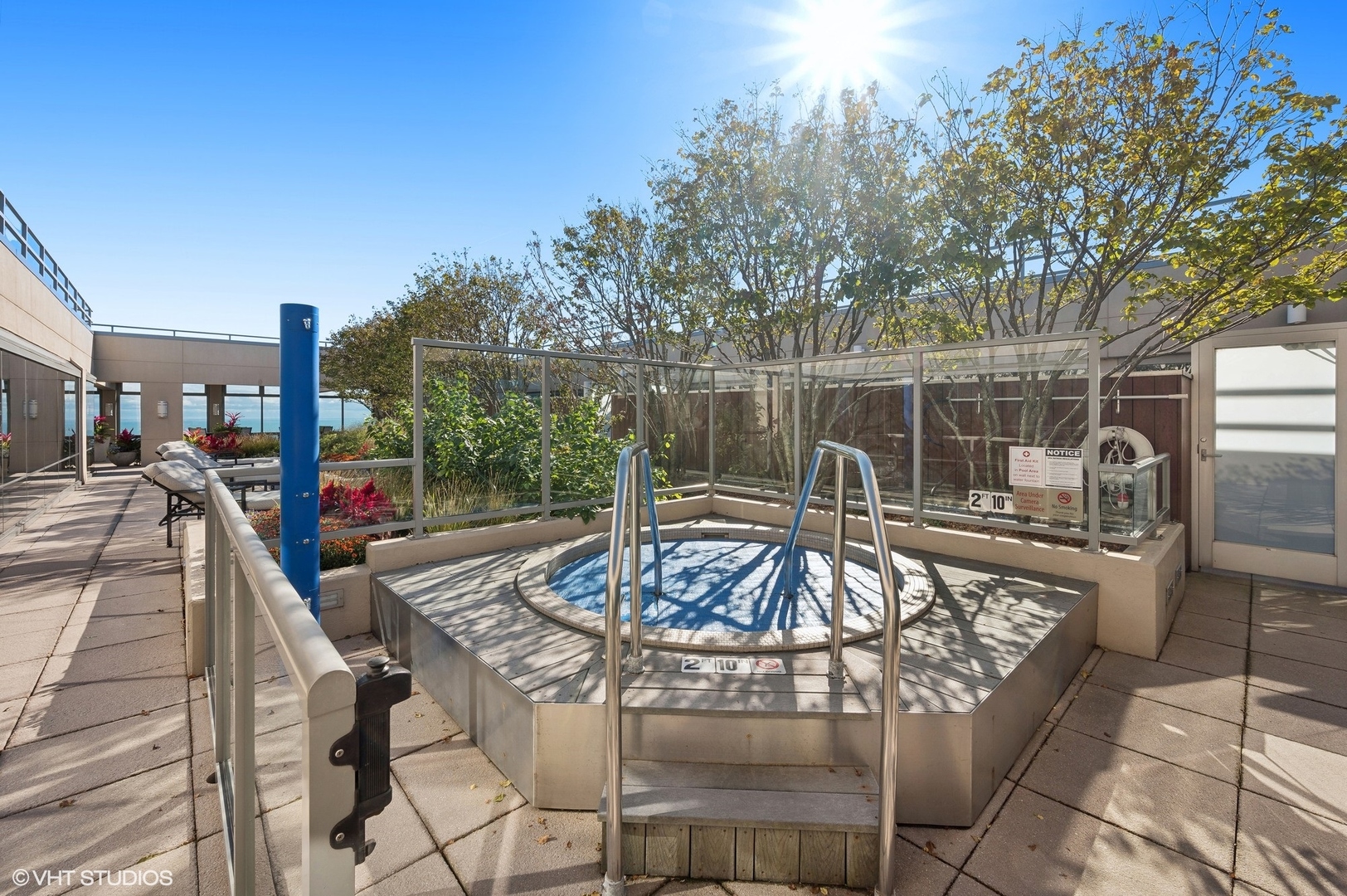 65 East Monroe Street, Unit 4623 Chicago, IL 60603 - Photo 23 of 26 a view of a swimming pool with a patio