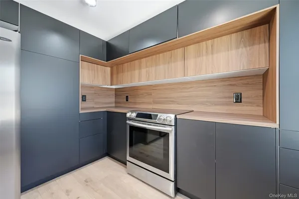 a kitchen with a stove and a sink