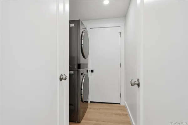 a view of storage utility and utility room