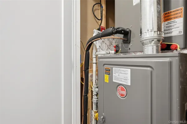 a view of a house with a sink and wooden fence