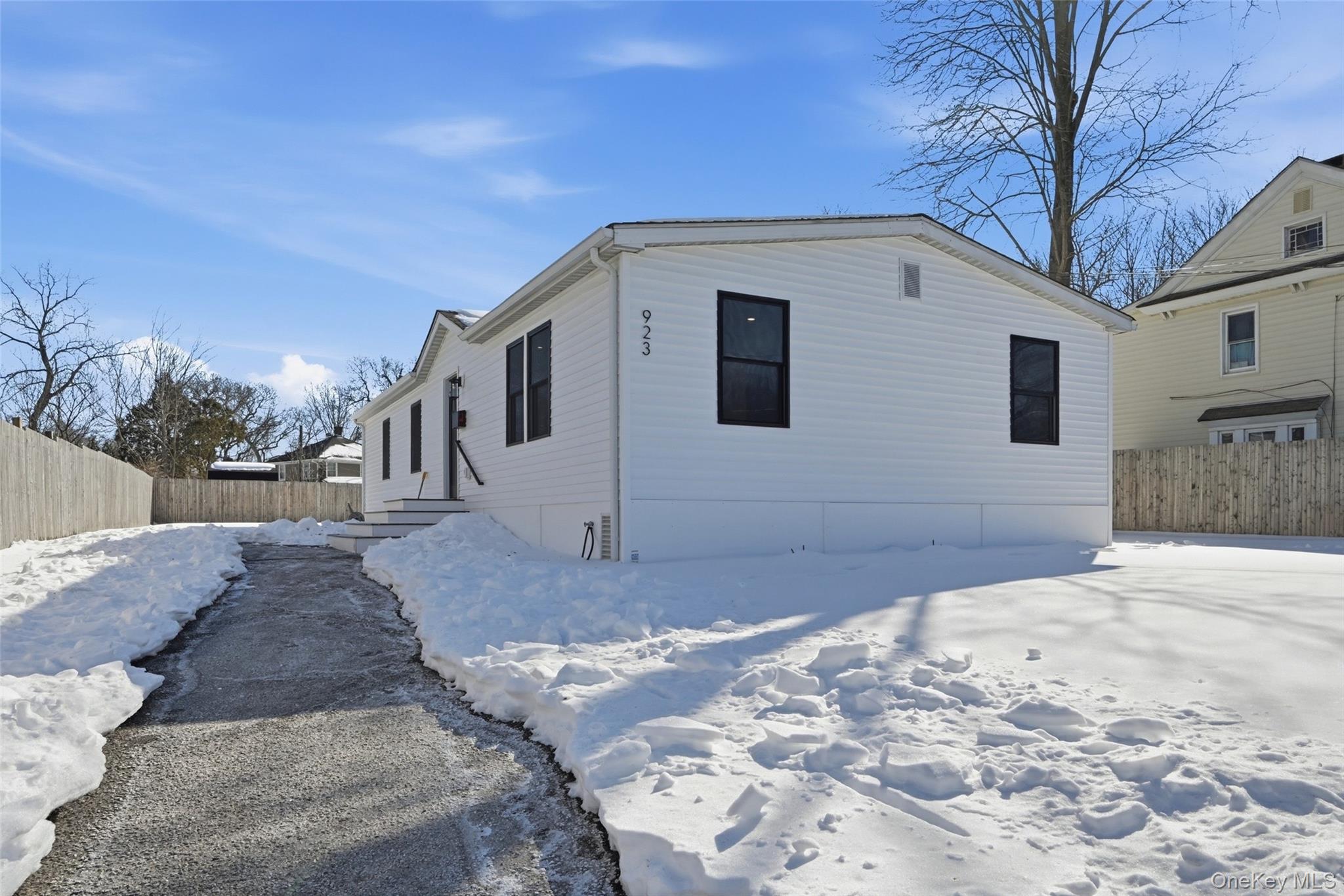923 East Main Street Riverhead, NY 11901 - Photo 30 of 30 a view of a house with a snow in the background