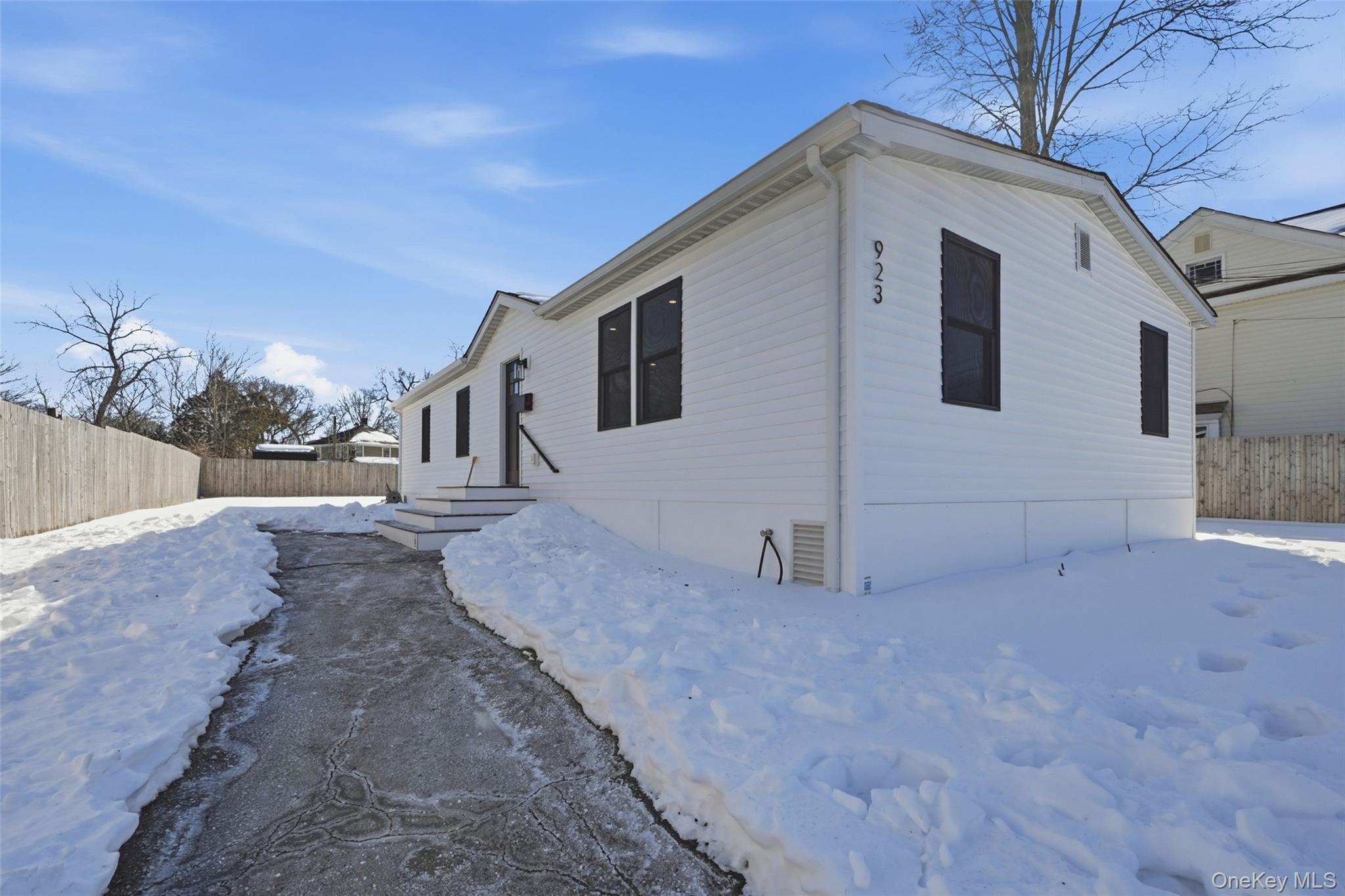 923 East Main Street Riverhead, NY 11901 - Photo 3 of 30 a view of a house with a yard