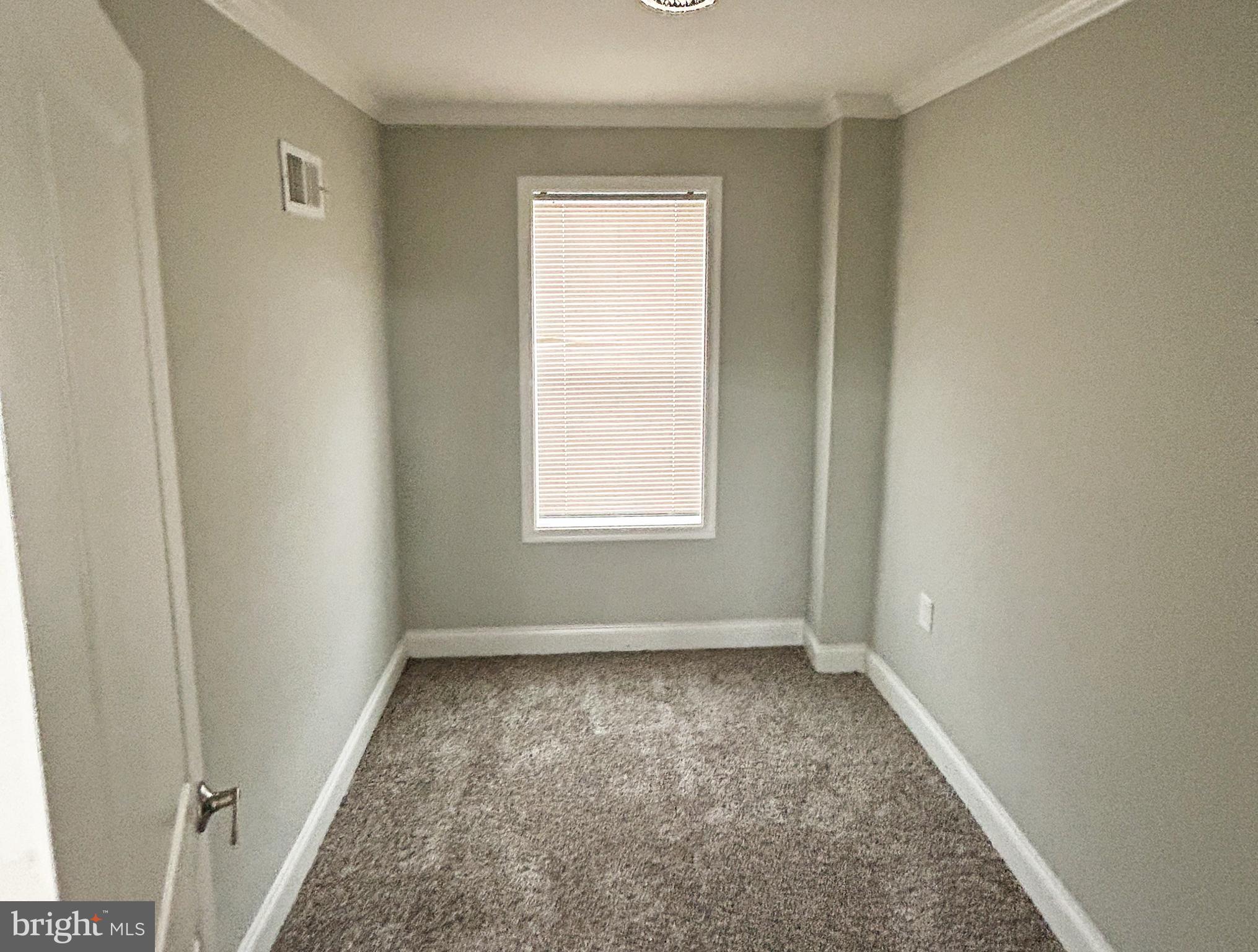 4140 Reisterstown Road Baltimore, MD 21215 - Photo 13 of 18 a view of room with window