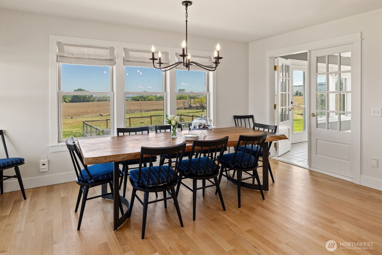 3920 Weaver Road Ellensburg, WA 98926 - Photo 9 of 40 a view of a dining room with furniture window and wooden floor