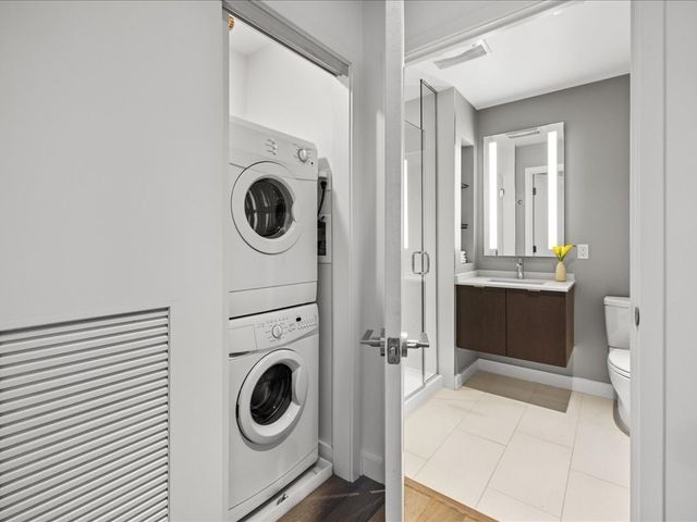 a living room with furniture and flowers