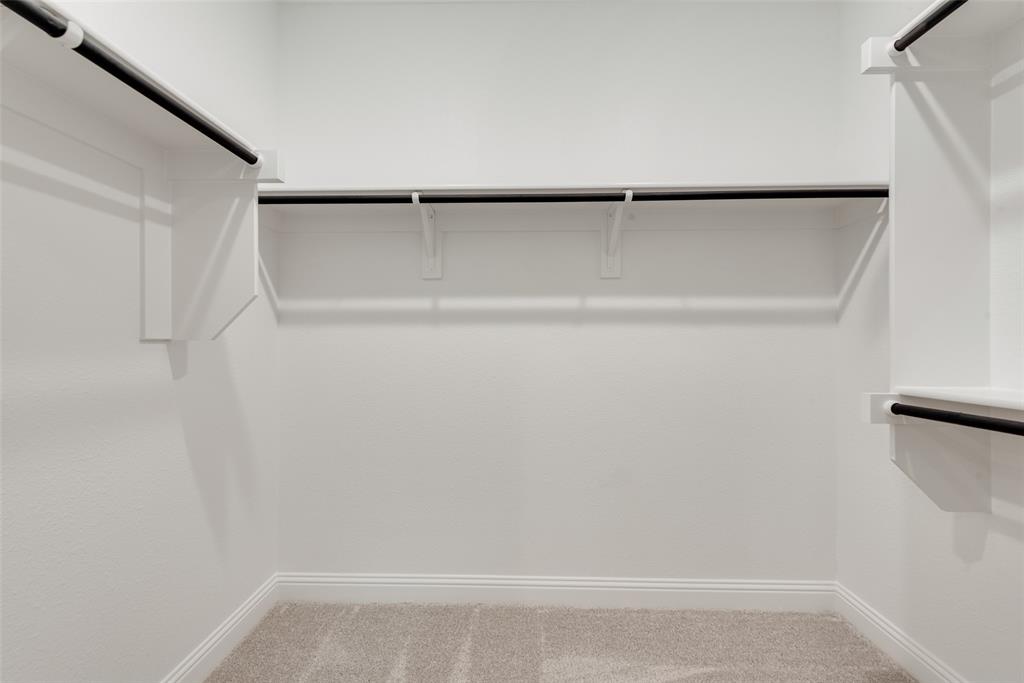 1013 Canoe Way Crowley, TX 76036 - Photo 19 of 26 a view of an empty walk in closet