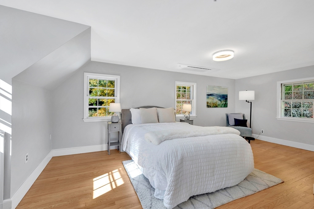 139 High Street Winchester, MA 01890 - Photo 14 of 24 a bed room with a bed and a window