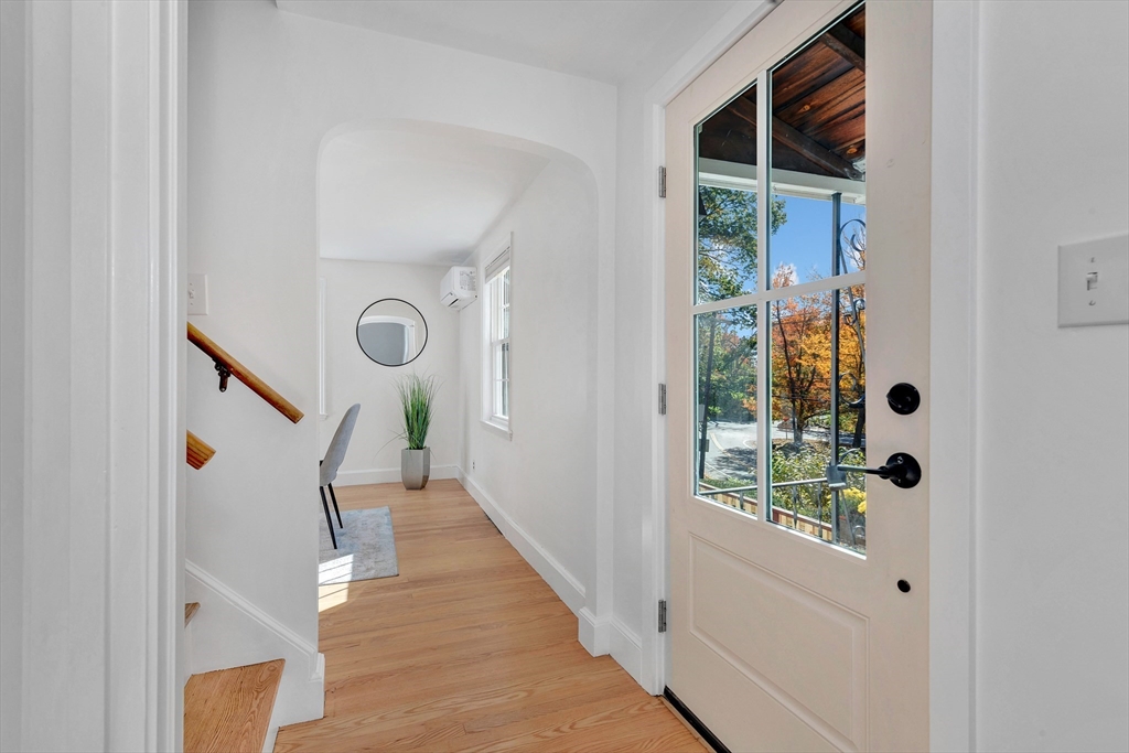 139 High Street Winchester, MA 01890 - Photo 2 of 24 a view of entryway and hall with wooden floor