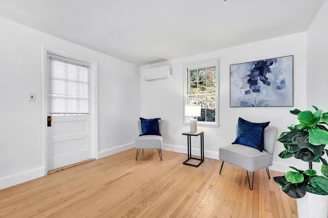 a workspace with furniture and wooden floor
