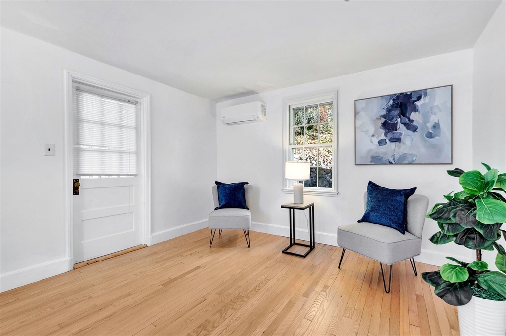 139 High Street Winchester, MA 01890 - Photo 5 of 24 a workspace with furniture and wooden floor