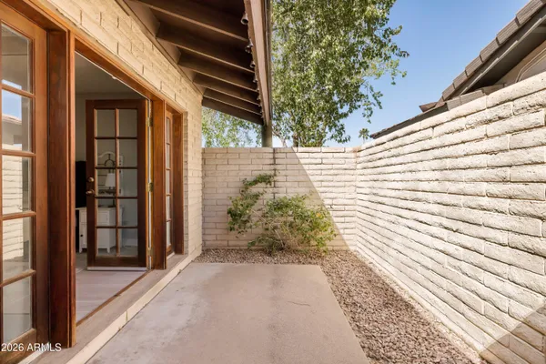 a view of a backyard of the house