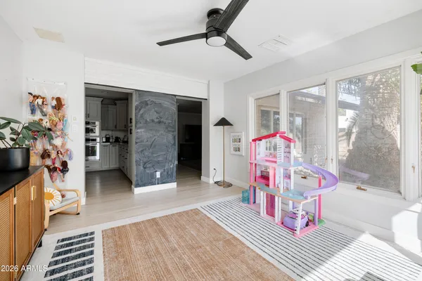 a view of a workspace with furniture