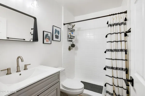 a view of a backyard with a patio